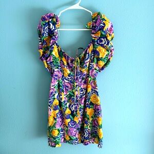 Floral dress with ruched sleeves